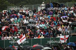 Fans in the rain. 05.07.2015. Formula 1 World Championship, Rd 9, British Grand Prix, Silverstone, England, Race Day.