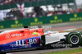 Roberto Merhi (ESP) Manor Marussia F1 Team and team mate Will Stevens (GBR) Manor Marussia F1 Team. 05.07.2015. Formula 1 World Championship, Rd 9, British Grand Prix, Silverstone, England, Race Day.