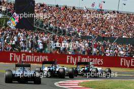 Felipe Massa (BRA) Williams FW37 leads team mate Valtteri Bottas (FIN) Williams FW37 and Lewis Hamilton (GBR) Mercedes AMG F1 W06. 05.07.2015. Formula 1 World Championship, Rd 9, British Grand Prix, Silverstone, England, Race Day.