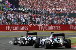 Felipe Massa (BRA) Williams FW37 leads team mate Valtteri Bottas (FIN) Williams FW37. 05.07.2015. Formula 1 World Championship, Rd 9, British Grand Prix, Silverstone, England, Race Day.
