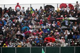 Fans in the rain. 05.07.2015. Formula 1 World Championship, Rd 9, British Grand Prix, Silverstone, England, Race Day.