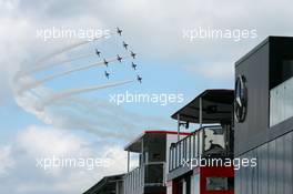 The Red Arrows fly over the paddock. 04.07.2015. Formula 1 World Championship, Rd 9, British Grand Prix, Silverstone, England, Qualifying Day.