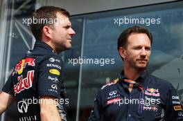 (L to R): Dominik Mitsch (AUT) Red Bull Racing Head of Marketing with Christian Horner (GBR) Red Bull Racing Team Principal. 04.07.2015. Formula 1 World Championship, Rd 9, British Grand Prix, Silverstone, England, Qualifying Day.