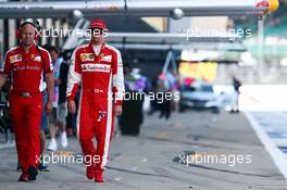Kimi Raikkonen (FIN) Ferrari with Mark Arnall (GBR) Personal Trainer. 04.07.2015. Formula 1 World Championship, Rd 9, British Grand Prix, Silverstone, England, Qualifying Day.