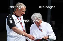(L to R): Tyler Alexander (USA) McLaren with Bernie Ecclestone (GBR). 04.07.2015. Formula 1 World Championship, Rd 9, British Grand Prix, Silverstone, England, Qualifying Day.