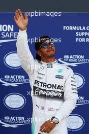 Lewis Hamilton (GBR) Mercedes AMG F1 celebrates his pole position in parc ferme. 04.07.2015. Formula 1 World Championship, Rd 9, British Grand Prix, Silverstone, England, Qualifying Day.