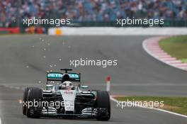 Lewis Hamilton (GBR) Mercedes AMG F1 W06 sends sparks flying. 04.07.2015. Formula 1 World Championship, Rd 9, British Grand Prix, Silverstone, England, Qualifying Day.
