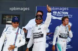 Qualifying top three in parc ferme (L to R): Felipe Massa (BRA) Williams, third; Lewis Hamilton (GBR) Mercedes AMG F1, pole position; Nico Rosberg (GER) Mercedes AMG F1, second. 04.07.2015. Formula 1 World Championship, Rd 9, British Grand Prix, Silverstone, England, Qualifying Day.