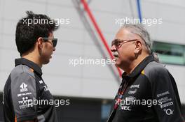 (L to R): Sergio Perez (MEX) Sahara Force India F1 with Dr. Vijay Mallya (IND) Sahara Force India F1 Team Owner. 04.07.2015. Formula 1 World Championship, Rd 9, British Grand Prix, Silverstone, England, Qualifying Day.