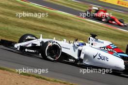 Felipe Massa (BRA) Williams FW37 waves to the fans at the end of qualifying. 04.07.2015. Formula 1 World Championship, Rd 9, British Grand Prix, Silverstone, England, Qualifying Day.