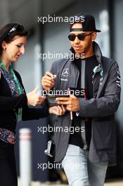 Lewis Hamilton (GBR) Mercedes AMG F1 signs autographs for the fans. 04.07.2015. Formula 1 World Championship, Rd 9, British Grand Prix, Silverstone, England, Qualifying Day.