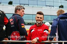 (L to R): Max Verstappen (NLD) Scuderia Toro Rosso with Will Stevens (GBR) Manor Marussia F1 Team on the drivers parade. 05.07.2015. Formula 1 World Championship, Rd 9, British Grand Prix, Silverstone, England, Race Day.