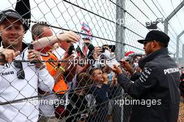 Lewis Hamilton (GBR) Mercedes AMG F1 with the fans. 05.07.2015. Formula 1 World Championship, Rd 9, British Grand Prix, Silverstone, England, Race Day.