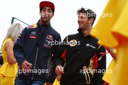 (L to R): Daniel Ricciardo (AUS) Red Bull Racing with Romain Grosjean (FRA) Lotus F1 Team on the drivers parade. 05.07.2015. Formula 1 World Championship, Rd 9, British Grand Prix, Silverstone, England, Race Day.