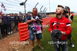 Will Stevens (GBR) Manor Marussia F1 Team with the fans. 05.07.2015. Formula 1 World Championship, Rd 9, British Grand Prix, Silverstone, England, Race Day.