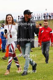 Lewis Hamilton (GBR) Mercedes AMG F1 with Natalie Pinkham (GBR) Sky Sports Presenter on the drivers parade. 05.07.2015. Formula 1 World Championship, Rd 9, British Grand Prix, Silverstone, England, Race Day.