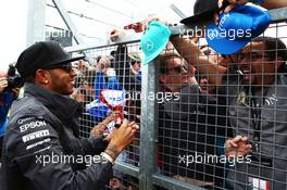 Lewis Hamilton (GBR) Mercedes AMG F1 with the fans. 05.07.2015. Formula 1 World Championship, Rd 9, British Grand Prix, Silverstone, England, Race Day.