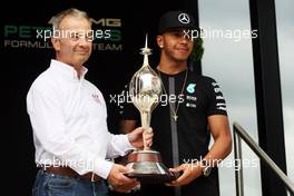 Lewis Hamilton (GBR) Mercedes AMG F1 receives the Hawthorn Memorial Trophy from Rob Jones (GBR) Motor Sports Association (MSA) Chief Executive.  02.07.2015. Formula 1 World Championship, Rd 9, British Grand Prix, Silverstone, England, Preparation Day.
