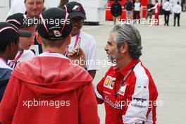 Maurizio Arrivabene (ITA) Ferrari Team Principal signs autographs for F1 in Schools children. 02.07.2015. Formula 1 World Championship, Rd 9, British Grand Prix, Silverstone, England, Preparation Day.