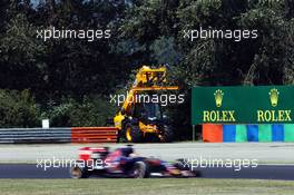 Max Verstappen (NLD) Scuderia Toro Rosso STR10 passes a circuit recovery vehicle. 24.07.2015. Formula 1 World Championship, Rd 10, Hungarian Grand Prix, Budapest, Hungary, Practice Day.