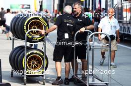 Lotus F1 Team mechanics with Pirelli tyres. 24.07.2015. Formula 1 World Championship, Rd 10, Hungarian Grand Prix, Budapest, Hungary, Practice Day.