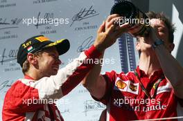 Race winner Sebastian Vettel (GER) Ferrari celebrates on the podium with James Allison (GBR) Ferrari Chassis Technical Director. 26.07.2015. Formula 1 World Championship, Rd 10, Hungarian Grand Prix, Budapest, Hungary, Race Day.