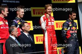 Daniil Kvyat (RUS), Red Bull Racing, Sebastian Vettel (GER), Scuderia Ferrari and Daniel Ricciardo (AUS), Red Bull Racing  26.07.2015. Formula 1 World Championship, Rd 10, Hungarian Grand Prix, Budapest, Hungary, Race Day.