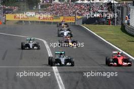 Nico Rosberg (GER), Mercedes AMG F1 Team and Kimi Raikkonen (FIN), Scuderia Ferrari  26.07.2015. Formula 1 World Championship, Rd 10, Hungarian Grand Prix, Budapest, Hungary, Race Day.