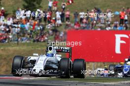 Felipe Massa (BRA) Williams FW37 sends sparks flying. 26.07.2015. Formula 1 World Championship, Rd 10, Hungarian Grand Prix, Budapest, Hungary, Race Day.