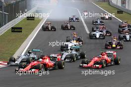 Start of the race, Sebastian Vettel (GER), Scuderia Ferrari  26.07.2015. Formula 1 World Championship, Rd 10, Hungarian Grand Prix, Budapest, Hungary, Race Day.