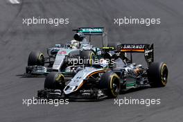 Sergio Perez (MEX), Sahara Force India and Lewis Hamilton (GBR), Mercedes AMG F1 Team  26.07.2015. Formula 1 World Championship, Rd 10, Hungarian Grand Prix, Budapest, Hungary, Race Day.