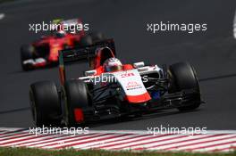 Will Stevens (GBR) Manor Marussia F1 Team leads Roberto Merhi (ESP) Manor Marussia F1 Team.  26.07.2015. Formula 1 World Championship, Rd 10, Hungarian Grand Prix, Budapest, Hungary, Race Day.