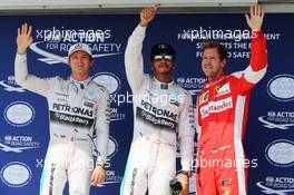 Qualifying top three in parc ferme (L to R): Nico Rosberg (GER) Mercedes AMG F1, second; Lewis Hamilton (GBR) Mercedes AMG F1, pole position; Sebastian Vettel (GER) Ferrari, third. 25.07.2015. Formula 1 World Championship, Rd 10, Hungarian Grand Prix, Budapest, Hungary, Qualifying Day.