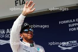 Lewis Hamilton (GBR) Mercedes AMG F1 celebrates his pole position in parc ferme. 25.07.2015. Formula 1 World Championship, Rd 10, Hungarian Grand Prix, Budapest, Hungary, Qualifying Day.