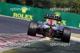Daniel Ricciardo (AUS) Red Bull Racing RB11 sends sparks flying. 25.07.2015. Formula 1 World Championship, Rd 10, Hungarian Grand Prix, Budapest, Hungary, Qualifying Day.