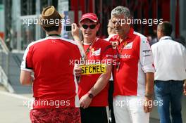 Maurizio Arrivabene (ITA) Ferrari Team Principal with fans. 23.07.2015. Formula 1 World Championship, Rd 10, Hungarian Grand Prix, Budapest, Hungary, Preparation Day.
