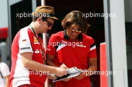 Roberto Merhi (ESP) Manor Marussia F1 Team signs autographs for the fans. 23.07.2015. Formula 1 World Championship, Rd 10, Hungarian Grand Prix, Budapest, Hungary, Preparation Day.