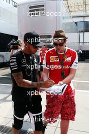 Lewis Hamilton (GBR) Mercedes AMG F1 signs autographs for the fans. 23.07.2015. Formula 1 World Championship, Rd 10, Hungarian Grand Prix, Budapest, Hungary, Preparation Day.