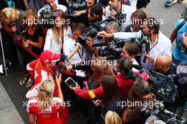 Sebastian Vettel (GER) Ferrari with the media. 04.09.2015. Formula 1 World Championship, Rd 12, Italian Grand Prix, Monza, Italy, Practice Day.