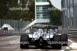Lewis Hamilton (GBR) Mercedes AMG F1 W06 and team mate Nico Rosberg (GER) Mercedes AMG F1 W06 at the pit lane exit. 04.09.2015. Formula 1 World Championship, Rd 12, Italian Grand Prix, Monza, Italy, Practice Day.