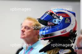 Jolyon Palmer (GBR) Lotus F1 Team Test and Reserve Driver with a tribute on his helmet for Justin Wilson. 04.09.2015. Formula 1 World Championship, Rd 12, Italian Grand Prix, Monza, Italy, Practice Day.