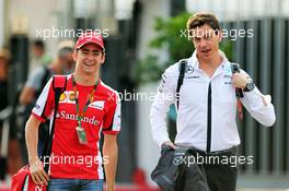 (L to R): Esteban Gutierrez (MEX) Ferrari Test and Reserve Driver with Toto Wolff (GER) Mercedes AMG F1 Shareholder and Executive Director. 04.09.2015. Formula 1 World Championship, Rd 12, Italian Grand Prix, Monza, Italy, Practice Day.