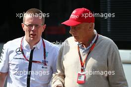 (L to R): Andy Cowell (GBR) Mercedes-Benz High Performance Powertrains Managing Director with Niki Lauda (AUT) Mercedes Non-Executive Chairman. 04.09.2015. Formula 1 World Championship, Rd 12, Italian Grand Prix, Monza, Italy, Practice Day.