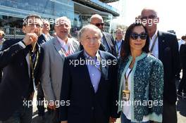 Jean Todt (FRA) FIA President with Michelle Yeoh (MAL) on the grid. 06.09.2015. Formula 1 World Championship, Rd 12, Italian Grand Prix, Monza, Italy, Race Day.