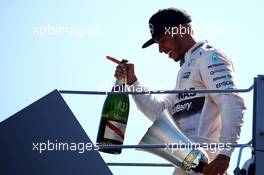 Race winner Lewis Hamilton (GBR) Mercedes AMG F1 celebrates on the podium. 06.09.2015. Formula 1 World Championship, Rd 12, Italian Grand Prix, Monza, Italy, Race Day.