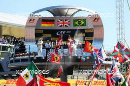 (L to R): Race winner Lewis Hamilton (GBR) Mercedes AMG F1 and second placed Sebastian Vettel (GER) Ferrari celebrate on the podium. 06.09.2015. Formula 1 World Championship, Rd 12, Italian Grand Prix, Monza, Italy, Race Day.