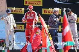 The podium (L to R): Felipe Massa (BRA) Williams, third; Sebastian Vettel (GER) Ferrari, second; George Lucas (USA) Star Wars Creator; Lewis Hamilton (GBR) Mercedes AMG F1, race winner. 06.09.2015. Formula 1 World Championship, Rd 12, Italian Grand Prix, Monza, Italy, Race Day.