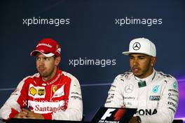 (L to R): Sebastian Vettel (GER) Ferrari with race winner Lewis Hamilton (GBR) Mercedes AMG F1 in the FIA Press Conference. 06.09.2015. Formula 1 World Championship, Rd 12, Italian Grand Prix, Monza, Italy, Race Day.