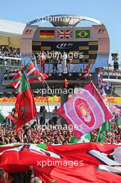 The podium (L to R): Felipe Massa (BRA) Williams, third; Sebastian Vettel (GER) Ferrari, second; George Lucas (USA) Star Wars Creator; Lewis Hamilton (GBR) Mercedes AMG F1, race winner. 06.09.2015. Formula 1 World Championship, Rd 12, Italian Grand Prix, Monza, Italy, Race Day.