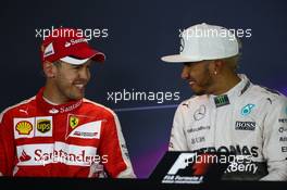 (L to R): Sebastian Vettel (GER) Ferrari and Lewis Hamilton (GBR) Mercedes AMG F1 in the FIA Press Conference. 06.09.2015. Formula 1 World Championship, Rd 12, Italian Grand Prix, Monza, Italy, Race Day.